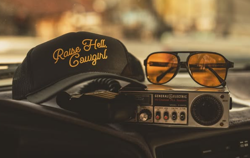 RAISE HELL COWGIRL TRUCKER HAT BLACK